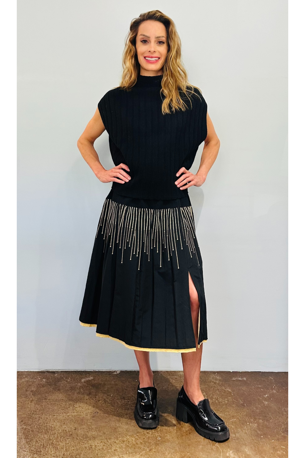 Sleeveless Black Sweater + Evia Skirt